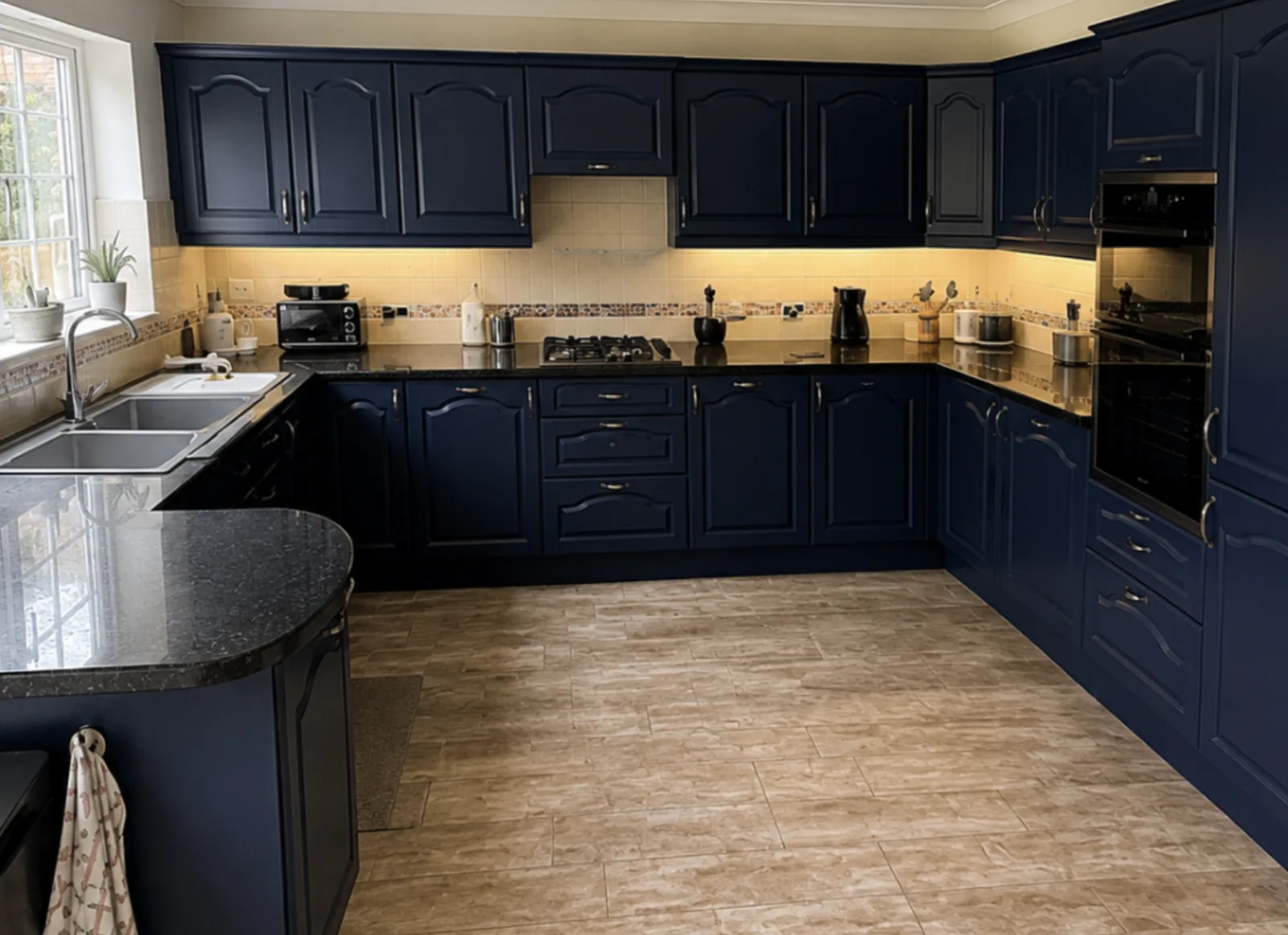 Sprayed navy kitchen units
